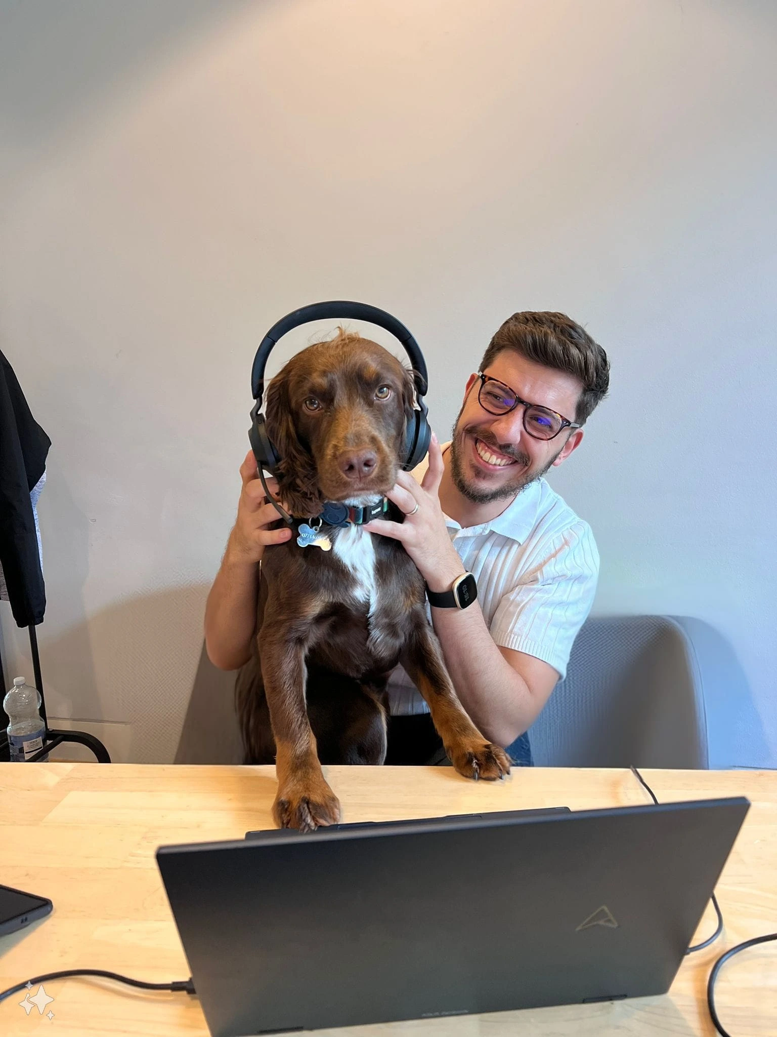 Charles Kyriakou smiling with dog